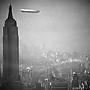 The Hindenburg floating past the Empire State Building in 1936 [1247x875]